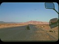 Birth of sand dunes on an epmty road